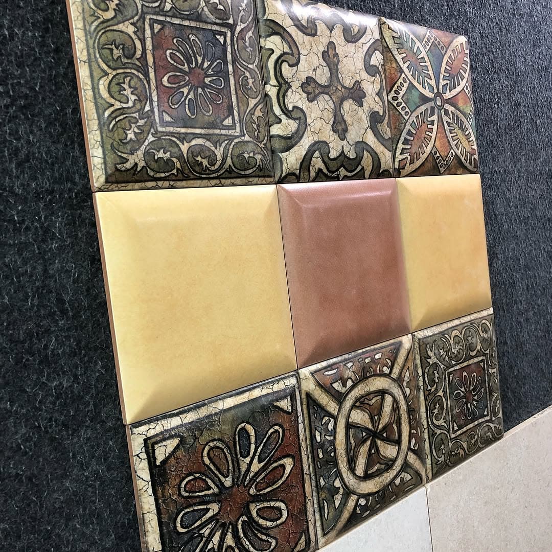 Moroccan-style decorative and plain bathroom tiles on display